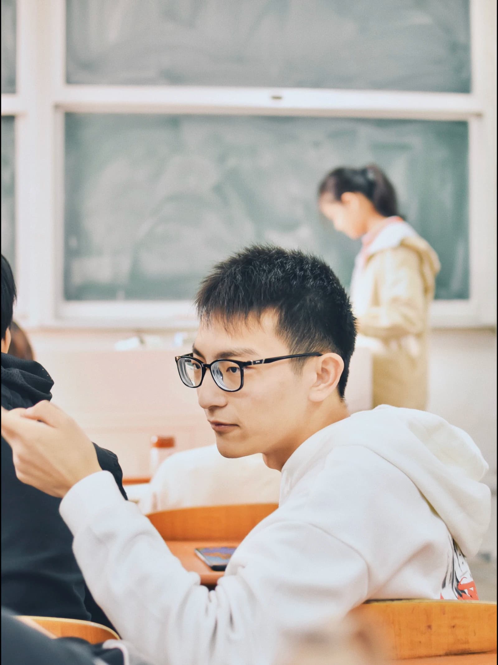 Adults seated in a training classroom ready to learn